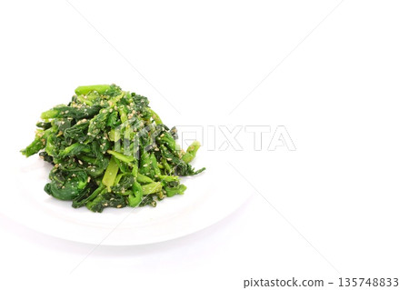 Rape blossoms with sesame dressing, spring food, bright background 135748833