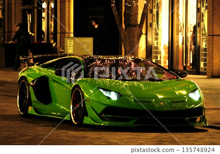 Lamborghini Aventador SVJ green supercar night city luxury car background material Lamborghini Aventador SVJ green supercar night city luxury car background material 135748924