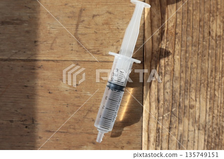 5ml syringe filled with clear liquid Medical equipment 5ml syringe filled with clear liquid Medical equipment 135749151