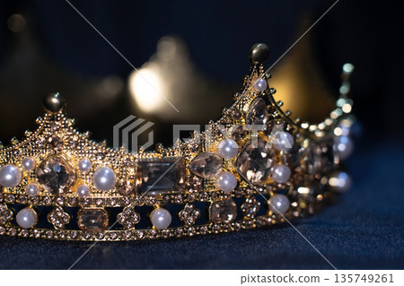 Ancient golden medieval crown with gemstones. Ancient golden medieval crown with gemstones. 135749261