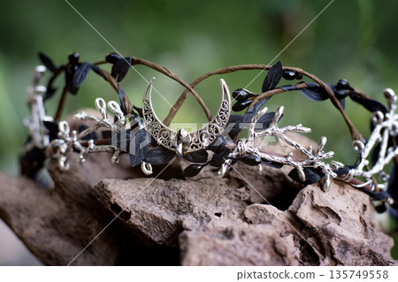Beautiful witch diadem. Decoration for ritual in forest. Halloween. Beautiful witch diadem. Decoration for ritual in forest. Halloween. 135749558