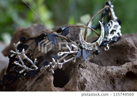 Beautiful witch diadem. Decoration for ritual in forest. Halloween. Beautiful witch diadem. Decoration for ritual in forest. Halloween. 135749560
