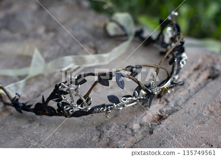 Beautiful witch diadem. Decoration for ritual in forest. Halloween. Beautiful witch diadem. Decoration for ritual in forest. Halloween. 135749561