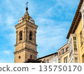Historic clock tower in the old center of Vitoria Gasteiz, Basque Country, Spain. Bright blue sky 135750170