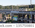 Keio Sagamihara Line train running through the Tama Hills 135750801