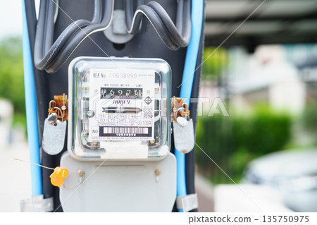 Bangkok, Thailand April 7, 2025 Electric measuring power meter for energy cost at home and office. Bangkok, Thailand April 7, 2025 Electric measuring power meter for energy cost at home and office. 135750975