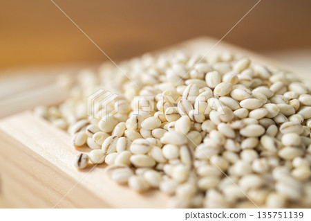 Glutinous barley in a wooden box Glutinous barley in a wooden box 135751139