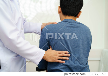 Physical therapy, Asian therapist doctor treat perform pain therapy in hospital. Physical therapy, Asian therapist doctor treat perform pain therapy in hospital. 135751150