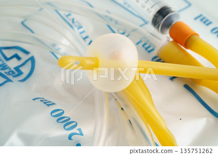 Foley catheter and urine drainage bag collect urine for disability or patient in hospital. Foley catheter and urine drainage bag collect urine for disability or patient in hospital. 135751262