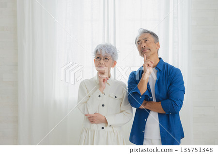 Senior couple thinking 135751348