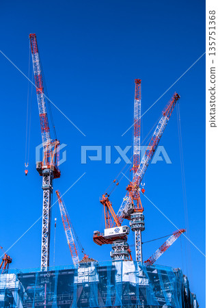 New landscape of Tokyo cityscape in Japan. TOKYO TORCH Giant cranes in Otemachi. Amazing construction speed 135751368