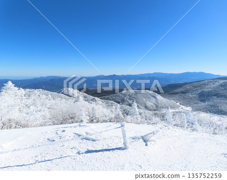 Yatsugatake in the midst of winter (view from the hiking trail leading to Kitayokodake) 135752259