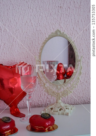 Close-Up of Glass and Heart Dessert with Balloons in Mirror Close-Up of Glass and Heart Dessert with Balloons in Mirror 135753305