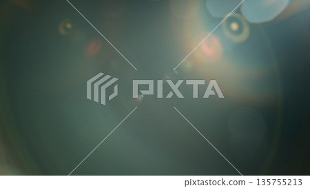 Real Lens Flare Reflections for Overlay or Transition Isolated on Black Background Real Lens Flare Reflections for Overlay or Transition Isolated on Black Background 135755213