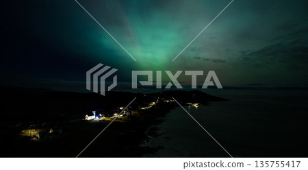 The Aurora Borealis, the northern lights, showing up above Portnoo in County Donegal, Ireland The Aurora Borealis, the northern lights, showing up above Portnoo in County Donegal, Ireland 135755417