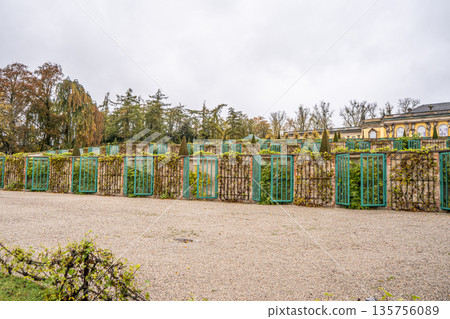 Sanssouci Palace of King Frederick II in Potsdam, Germany. Old building architecture in Rococo style. Sanssouci Palace of King Frederick II in Potsdam, Germany. Old building architecture in Rococo style. 135756089
