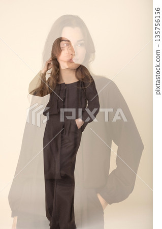 Woman showing double exposure effect expressing inner identity 135756156