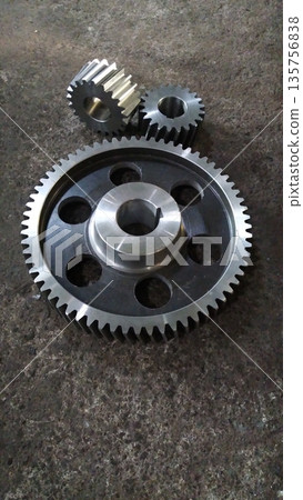 Metal gear wheel engine, mechanic industry concept. Mechanical engineering. Finished products. 135756838