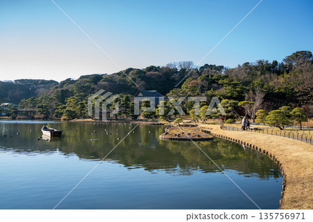 A Japanese garden with a pond and pine trees at Sankeien Garden in Yokohama A Japanese garden with a pond and pine trees at Sankeien Garden in Yokohama 135756971