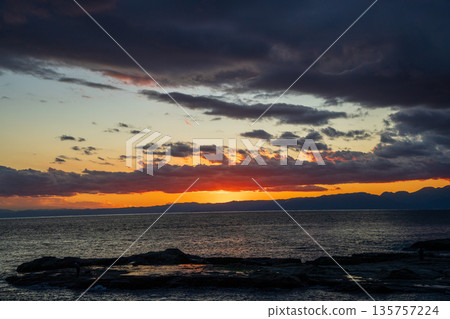 Dramatic cloudscape of the sunset over the sea at Enoshima 135757224
