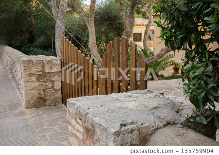 Big wooden entry gate in the house in Spain Big wooden entry gate in the house in Spain 135759904