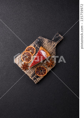 Strawberry cheesecake, a slice of sweet pie, a classic cheesecake dessert. Strawberry cheesecake 135759972