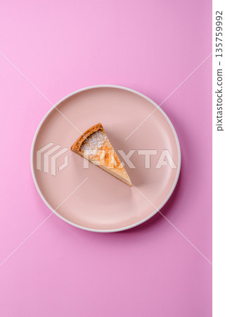 Cheesecake, a slice of sweet pie, a classic cheese dessert. Cheesecake as a food background Cheesecake, a slice of sweet pie, a classic cheese dessert. Cheesecake as a food background 135759992