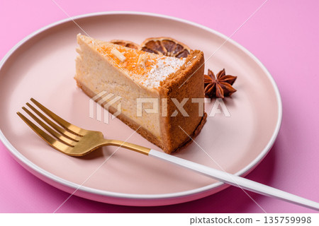 Cheesecake, a slice of sweet pie, a classic cheese dessert. Cheesecake as a food background 135759998