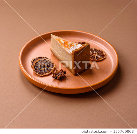 Cheesecake, a slice of sweet pie, a classic cheese dessert. Cheesecake as a food background Cheesecake, a slice of sweet pie, a classic cheese dessert. Cheesecake as a food background 135760008