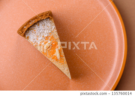 Cheesecake, a slice of sweet pie, a classic cheese dessert. Cheesecake as a food background Cheesecake, a slice of sweet pie, a classic cheese dessert. Cheesecake as a food background 135760014