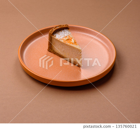 Cheesecake, a slice of sweet pie, a classic cheese dessert. Cheesecake as a food background Cheesecake, a slice of sweet pie, a classic cheese dessert. Cheesecake as a food background 135760021