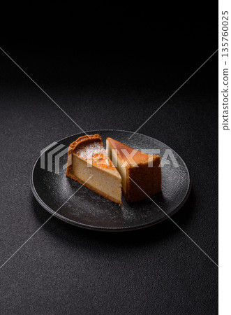 Cheesecake, a slice of sweet pie, a classic cheese dessert. Cheesecake as a food background Cheesecake, a slice of sweet pie, a classic cheese dessert. Cheesecake as a food background 135760025