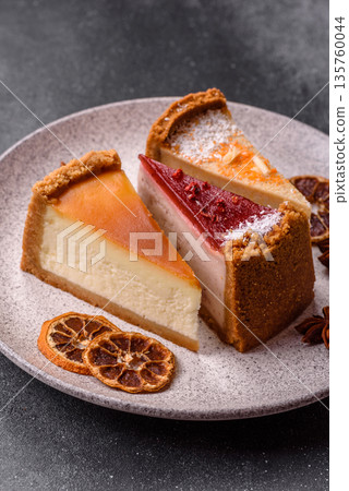 Cheesecake, a slice of sweet pie, a classic cheese dessert. Cheesecake as a food background 135760044