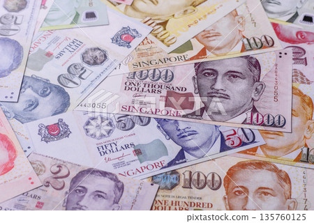 Money, currency of Singapore, dollar banknotes of various denominations. Singapore money Money, currency of Singapore, dollar banknotes of various denominations. Singapore money 135760125
