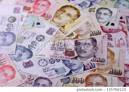 Money, currency of Singapore, dollar banknotes of various denominations. Singapore money Money, currency of Singapore, dollar banknotes of various denominations. Singapore money 135760129