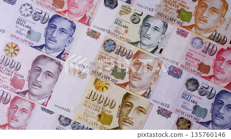Money, currency of Singapore, dollar banknotes of various denominations. Singapore money Money, currency of Singapore, dollar banknotes of various denominations. Singapore money 135760146