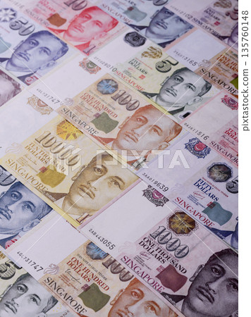 Money, currency of Singapore, dollar banknotes of various denominations. Singapore money Money, currency of Singapore, dollar banknotes of various denominations. Singapore money 135760148