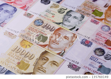 Money, currency of Singapore, dollar banknotes of various denominations. Singapore money Money, currency of Singapore, dollar banknotes of various denominations. Singapore money 135760149