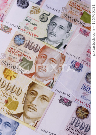 Money, currency of Singapore, dollar banknotes of various denominations. Singapore money Money, currency of Singapore, dollar banknotes of various denominations. Singapore money 135760151