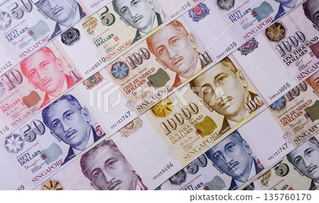 Money, currency of Singapore, dollar banknotes of various denominations. Singapore money Money, currency of Singapore, dollar banknotes of various denominations. Singapore money 135760170