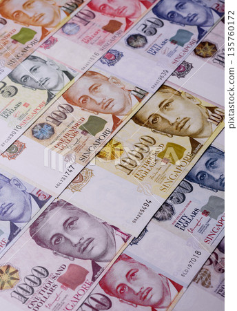 Money, currency of Singapore, dollar banknotes of various denominations. Singapore money Money, currency of Singapore, dollar banknotes of various denominations. Singapore money 135760172