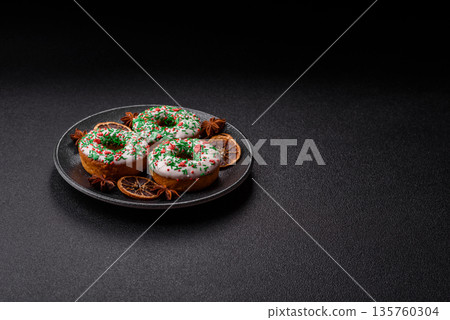 Christmas donuts or doughnuts, holiday winter sweets with sprinkles. Christmas donuts 135760304