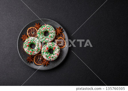 Christmas donuts or doughnuts, holiday winter sweets with sprinkles. Christmas donuts Christmas donuts or doughnuts, holiday winter sweets with sprinkles. Christmas donuts 135760305