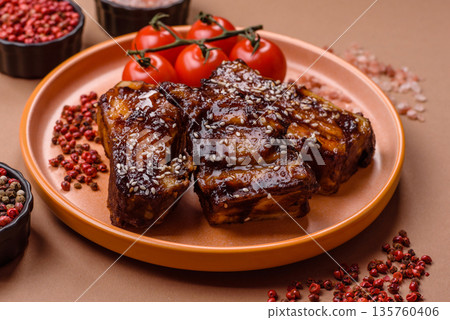 Grilled or bbq pork ribs with sauce, a food prepared for dinner. Grilled ribs 135760406