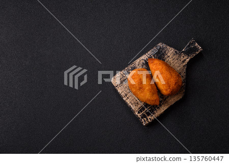 Chicken Kyiv cutlet with buttery filling, a lunch of chicken breast meat. Chicken Kyiv cutlet Chicken Kyiv cutlet with buttery filling, a lunch of chicken breast meat. Chicken Kyiv cutlet 135760447