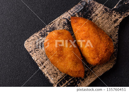 Chicken Kyiv cutlet with buttery filling, a lunch of chicken breast meat. Chicken Kyiv cutlet Chicken Kyiv cutlet with buttery filling, a lunch of chicken breast meat. Chicken Kyiv cutlet 135760451