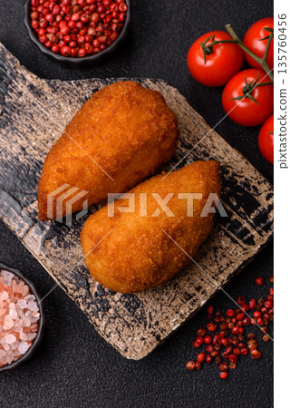 Chicken Kyiv cutlet with buttery filling, a lunch of chicken breast meat. Chicken Kyiv cutlet Chicken Kyiv cutlet with buttery filling, a lunch of chicken breast meat. Chicken Kyiv cutlet 135760456