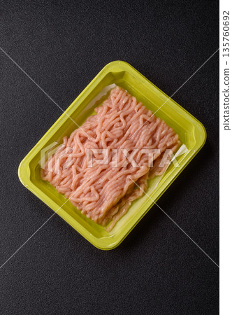 Raw ground chicken for burgers and other food. Raw minced chicken meat Raw ground chicken for burgers and other food. Raw minced chicken meat 135760692