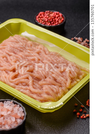 Raw ground chicken for burgers and other food. Raw minced chicken meat 135760701