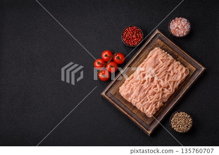 Raw ground chicken for burgers and other food. Raw minced chicken meat Raw ground chicken for burgers and other food. Raw minced chicken meat 135760707